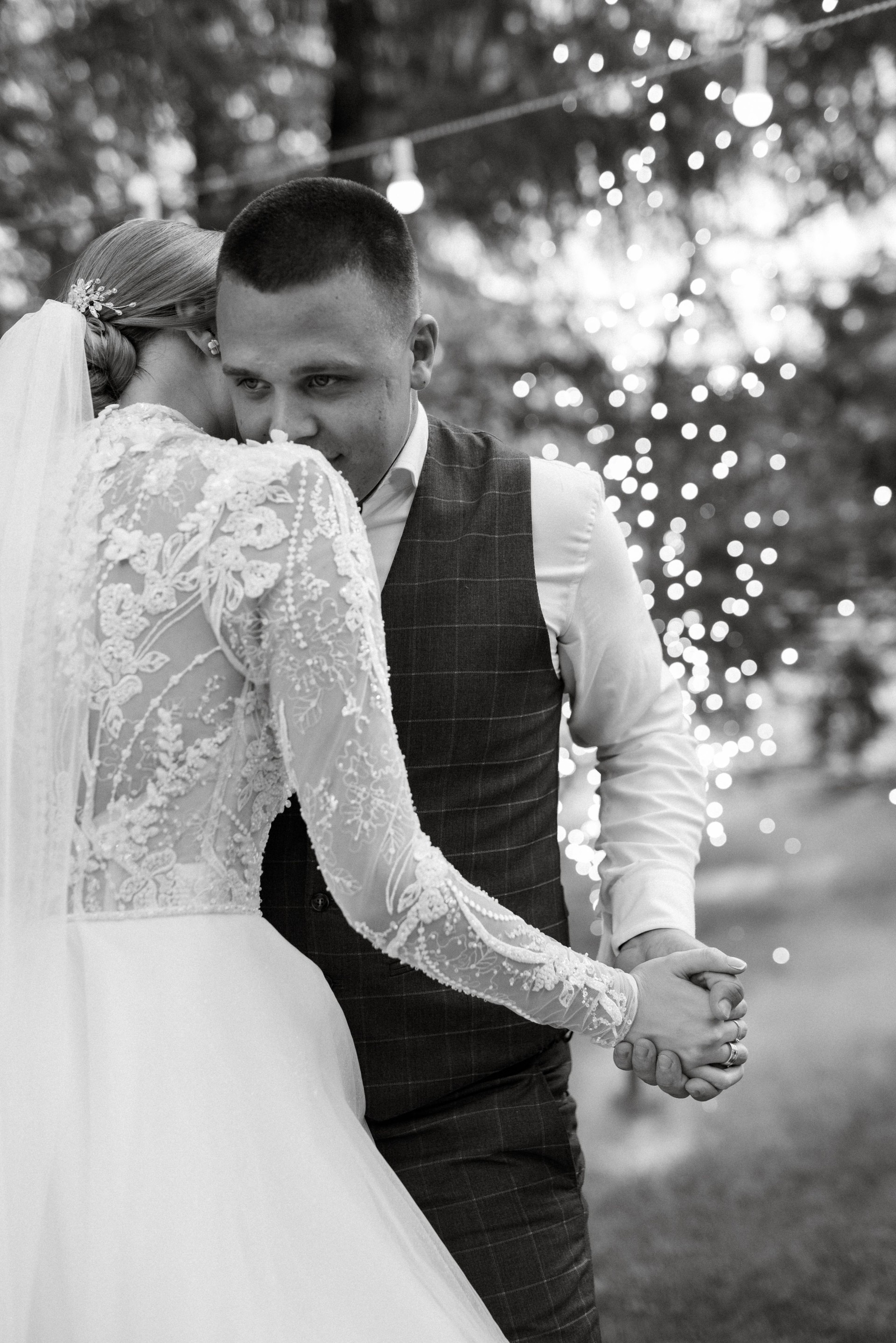 the first wedding dance of the bride and groom on a green meadow