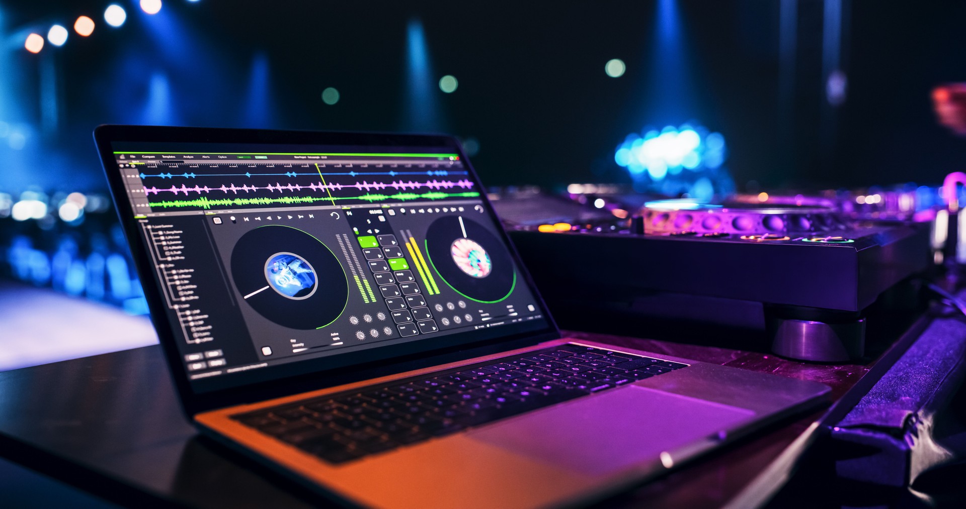 Laptop Computer with Working DJ Music Software Standing on a Table on Stage at a Concert. Beautiful Female Music Producer Reflecting on the Display, While She is Performing at a Festival